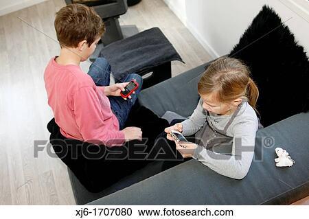 Children using smartphones View Large Photo Image Stock Image - Children using smartphones. Fotosearch