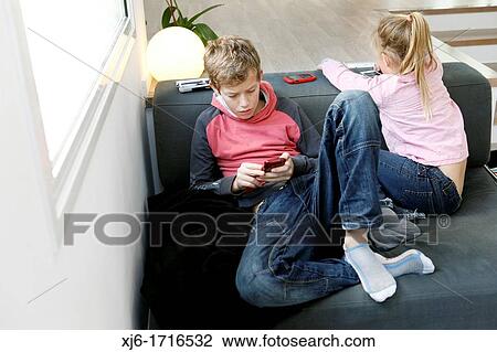 Children using smartphones View Large Photo Image Stock Image - Children using smartphones. Fotosearch