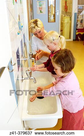 Children washing hands View Large Photo Image Stock Photo - Children washing hands. Fotosearch