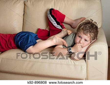 Stock Photo - Children watching television. Fotosearch