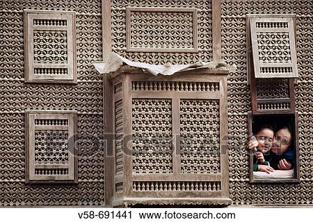 Children watching the street life from a? mashrabiya? window in Old Cairo. Egypt View Large Photo Image Stock Image - Children watching the street life from a? mashrabiya? window in Old Cairo. Egypt. Fotosearch