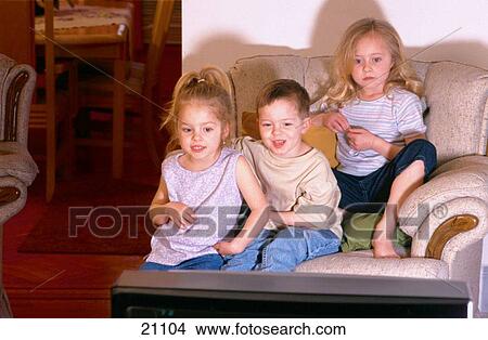 Children watching TV View Large Photo Image Picture - Children watching TV. Fotosearch