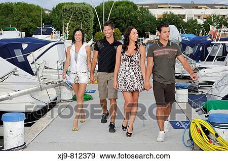 Children who walk among the boats. View Large Photo Image Stock Photo - Children who walk among the boats.. Fotosearch