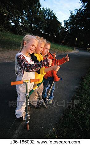 Children with scooters View Large Photo Image Stock Image - Children with scooters. Fotosearch