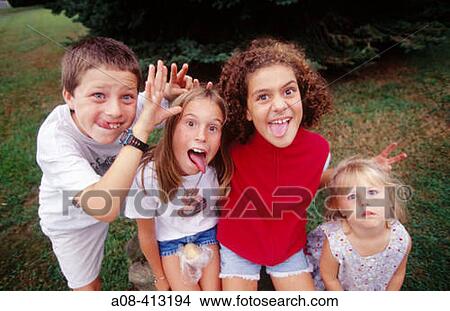 Children with silly expressions. USA. View Large Photo Image Picture - Children with silly expressions. USA.. Fotosearch