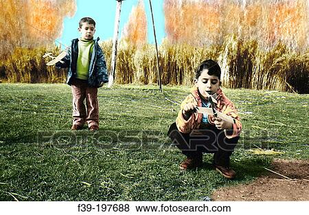 Children with toy planes View Large Photo Image Stock Photo - Children with toy planes. Fotosearch