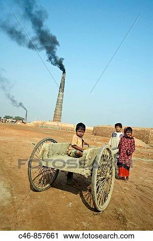 Children working on a brick factory. Near Kolkata. Ganges River. India. View Large Photo Image Stock Image - Children working on a brick factory. Near Kolkata. Ganges River. India.. Fotosearch
