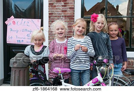 Childrens birthday party with young girls aged 4 to 7 in quiet small town of Edam Holland outside of Amsterdam with great small peaceful feel View Large Photo Image Stock Photo - Childrens birthday party with young girls aged 4 to 7 in quiet small town of Edam Holland outside of Amsterdam with great small peaceful feel. Fotosearch
