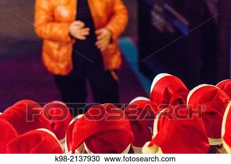 Children's choir in Santa's hats singing Christmas carols, Teatre Principal de Palma, Palau Reial, Palma, Majorca, Balearic Islands, Spain View Large Photo Image Stock Image - Children's choir in Santa's hats singing Christmas carols, Teatre Principal de Palma, Palau Reial, Palma, Majorca, Balearic Islands, Spain. Fotosearch