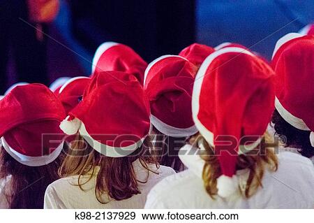 Children's choir in Santa's hats singing Christmas carols, Teatre Principal de Palma, Palau Reial, Palma, Majorca, Balearic Islands, Spain View Large Photo Image Stock Photo - Children's choir in Santa's hats singing Christmas carols, Teatre Principal de Palma, Palau Reial, Palma, Majorca, Balearic Islands, Spain. Fotosearch
