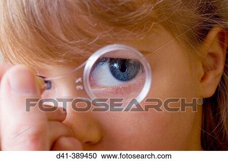 Child's eye seen through magnifying glass View Large Photo Image Stock Image - Child's eye seen through magnifying glass. Fotosearch