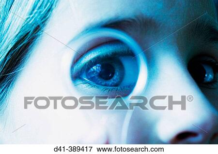 Child's eye seen through magnifying glass View Large Photo Image Stock Photo - Child's eye seen through magnifying glass. Fotosearch