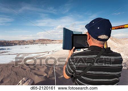 Chile, Atacama Desert, San Pedro de Atacama, Valle de la Luna, visitors, sunset. View Large Photo Image Stock Image - Chile, Atacama Desert, San Pedro de Atacama, Valle de la Luna, visitors, sunset.. Fotosearch