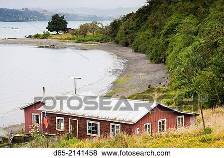 Chile, Chiloe Archipelago, Quinchao Island, Changuitad, waterfront house. View Large Photo Image Stock Photo - Chile, Chiloe Archipelago, Quinchao Island, Changuitad, waterfront house.. Fotosearch