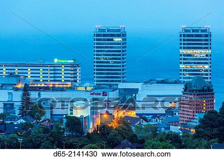 Chile, Los Lagos Region, Puerto Montt, buildings of the Mall Paseo Costanera, elevated view, dawn. View Large Photo Image Stock Image - Chile, Los Lagos Region, Puerto Montt, buildings of the Mall Paseo Costanera, elevated view, dawn.. Fotosearch