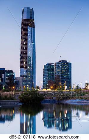 Chile, Santiago, Vitacura area, Parque Bicentenario park, view of the Gran Torre Santiago tower, dawn. View Large Photo Image Stock Photo - Chile, Santiago, Vitacura area, Parque Bicentenario park, view of the Gran Torre Santiago tower, dawn.. Fotosearch