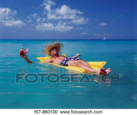 Stock Image - Chilling in the Caribbean. Fotosearch