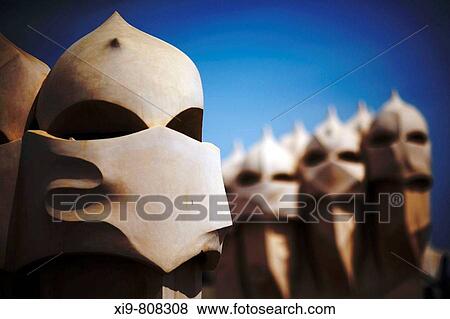 Chimneys on the roof terrace of the Casa Mila (aka La Pedrera) by Gaudi, Barcelona. Catalonia, Spain View Large Photo Image Stock Photo - Chimneys on the roof terrace of the Casa Mila (aka La Pedrera) by Gaudi, Barcelona. Catalonia, Spain. Fotosearch