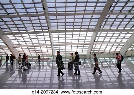 China, Beijing, Beijing Capital International Airport, PEK, Terminal 3, T3, Express Train Station, platform, Asian, man, woman, arriving passengers, inside, interior, silhouette,. View Large Photo Image Picture - China, Beijing, Beijing Capital International Airport, PEK, Terminal 3, T3, Express Train Station, platform, Asian, man, woman, arriving passengers, inside, interior, silhouette,.. Fotosearch