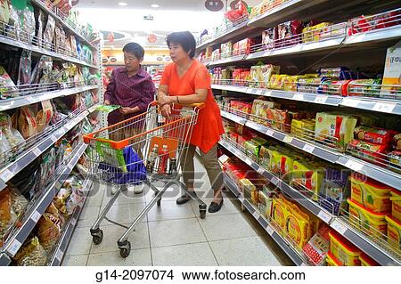 China, Beijing, Guang An Men Nei Da Jie, Guanganmen Outer Street, Rainbow Center, centre, shopping, supermarket, grocery store, sale, display, shelves, Asian, woman, customer, aisle, cart,. View Large Photo Image Picture - China, Beijing, Guang An Men Nei Da Jie, Guanganmen Outer Street, Rainbow Center, centre, shopping, supermarket, grocery store, sale, display, shelves, Asian, woman, customer, aisle, cart,.. Fotosearch