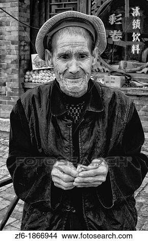 China Beijing Local old man in park with old traditional dress in Beijing China View Large Photo Image Picture - China Beijing Local old man in park with old traditional dress in Beijing China. Fotosearch