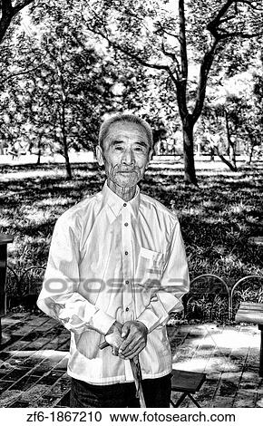 China Beijing Local old man in park with old traditional costume in Beijing China View Large Photo Image Stock Image - China Beijing Local old man in park with old traditional costume in Beijing China. Fotosearch