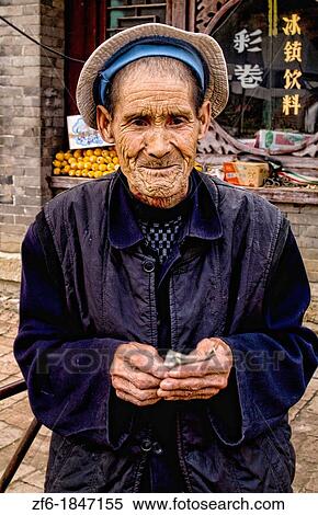 China Beijing Local old man in park with old traditional dress in Beijing China View Large Photo Image Stock Photography - China Beijing Local old man in park with old traditional dress in Beijing China. Fotosearch