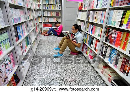 China, Beijing, Wangfujing Xinhua Bookstore, shopping, inside, sale, books, shelves, Asian, woman, browsing, Chinese characters h? nz? pinyin,. View Large Photo Image Stock Photography - China, Beijing, Wangfujing Xinhua Bookstore, shopping, inside, sale, books, shelves, Asian, woman, browsing, Chinese characters h? nz? pinyin,.. Fotosearch