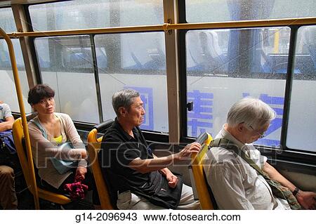 China, Beijing, Xicheng District, Guang An Men Nei Da Jie, Guanganmen Inner Street, Asian, woman, public bus, riders, sitting,. View Large Photo Image Stock Image - China, Beijing, Xicheng District, Guang An Men Nei Da Jie, Guanganmen Inner Street, Asian, woman, public bus, riders, sitting,.. Fotosearch