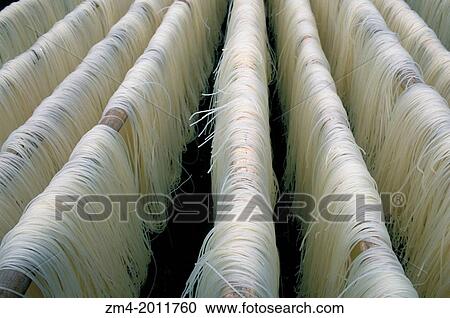 CHINA, GUANGXI PROVINCE, NEAR GUILIN, XING PING VILLAGE SCENE, NOODLES DRYING, CLOSE-UP. View Large Photo Image Stock Image - CHINA, GUANGXI PROVINCE, NEAR GUILIN, XING PING VILLAGE SCENE, NOODLES DRYING, CLOSE-UP.. Fotosearch