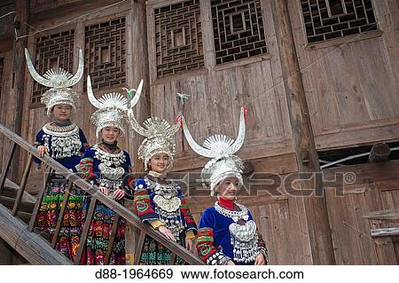 China, Guizhou province, Langde village, Long Skirt Miao people in traditional dress. View Large Photo Image Stock Photo - China, Guizhou province, Langde village, Long Skirt Miao people in traditional dress.. Fotosearch