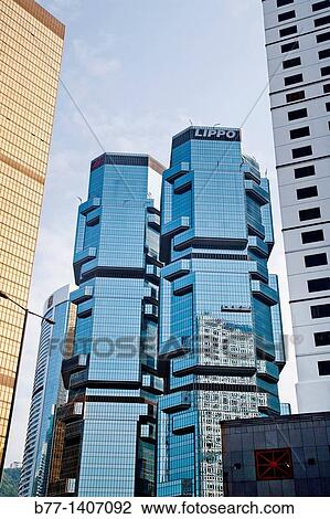 China, Hong Kong, Admiralty highrise, the Lippo Twin Towers sandwiched between the Far East Finance Centre and the Bank of America Tower View Large Photo Image Stock Image - China, Hong Kong, Admiralty highrise, the Lippo Twin Towers sandwiched between the Far East Finance Centre and the Bank of America Tower. Fotosearch