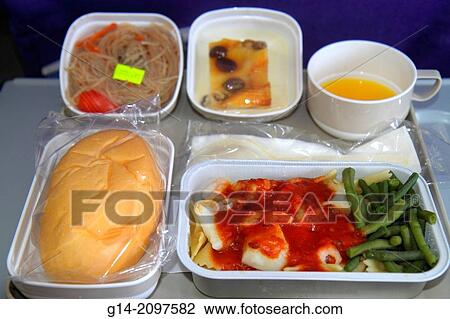 China, Hong Kong, Chek Lap Kok, Hong Kong International Airport, HKG, onboard, Air China, airline, food, tray, seafood, green beans, roll, bread, noodles, dessert,. View Large Photo Image Stock Image - China, Hong Kong, Chek Lap Kok, Hong Kong International Airport, HKG, onboard, Air China, airline, food, tray, seafood, green beans, roll, bread, noodles, dessert,.. Fotosearch