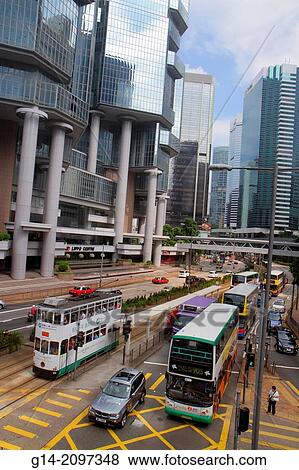 China, Hong Kong, Island, Admiralty, Lippo Centre, center, urban, architecture, columns, city skyline, skyscrapers, buildings, Queensway, highway, traffic, double decker tram Tramways, public transportation, tracks, bus,. View Large Photo Image Stock Photo - China, Hong Kong, Island, Admiralty, Lippo Centre, center, urban, architecture, columns, city skyline, skyscrapers, buildings, Queensway, highway, traffic, double decker tram Tramways, public transportation, tracks, bus,.. Fotosearch