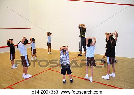 China, Hong Kong, Island, Central, Hong Kong Squash Centre, center, court, class, Asian, man, teacher, boy, girl, student, warm up, warming, exercising, stretching,. View Large Photo Image Stock Image - China, Hong Kong, Island, Central, Hong Kong Squash Centre, center, court, class, Asian, man, teacher, boy, girl, student, warm up, warming, exercising, stretching,.. Fotosearch