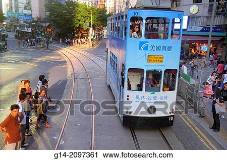 China, Hong Kong, Island, Wan Chai, Hennessy Road, businesses, pedestrians, double decker tram Tramways, public transportation, Asian, woman, rider, passenger, tracks, Cantonese Chinese characters h? nz? pinyin,. View Large Photo Image Stock Image - China, Hong Kong, Island, Wan Chai, Hennessy Road, businesses, pedestrians, double decker tram Tramways, public transportation, Asian, woman, rider, passenger, tracks, Cantonese Chinese characters h? nz? pinyin,.. Fotosearch