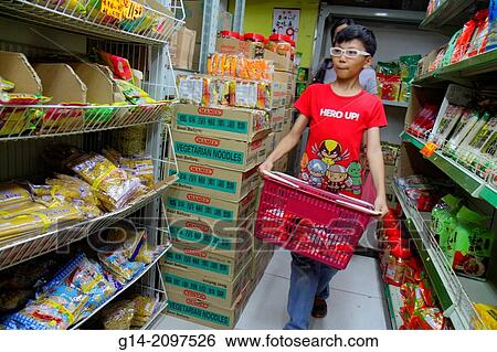 China, Hong Kong, Kowloon, Sham Shui Po, shopping, grocery store, supermarket, sale, display, shelves, Asian, boy, carrying, basket, Cantonese Chinese characters h? nz? pinyin,. View Large Photo Image Stock Photograph - China, Hong Kong, Kowloon, Sham Shui Po, shopping, grocery store, supermarket, sale, display, shelves, Asian, boy, carrying, basket, Cantonese Chinese characters h? nz? pinyin,.. Fotosearch