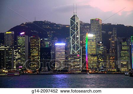 China, Hong Kong, Kowloon, Tsim Sha Tsui, Kowloon Public Pier, view, Victoria Harbour, harbor, Island, city skyline, high rise skyscrapers, buildings, dusk, night,. View Large Photo Image Stock Image - China, Hong Kong, Kowloon, Tsim Sha Tsui, Kowloon Public Pier, view, Victoria Harbour, harbor, Island, city skyline, high rise skyscrapers, buildings, dusk, night,.. Fotosearch