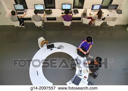 China, Hong Kong, New Territories, Sha Tin, Ma Liu Shui, New Asia College, Chinese University of Hong Kong, campus, student, Asian, teen, boy, studying, Ch? ien Mu University Library, inside, table, round, computers, Internet access, overhead view,. View Large Photo Image Stock Photo - China, Hong Kong, New Territories, Sha Tin, Ma Liu Shui, New Asia College, Chinese University of Hong Kong, campus, student, Asian, teen, boy, studying, Ch? ien Mu University Library, inside, table, round, computers, Internet access, overhead view,.. Fotosearch
