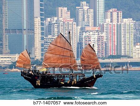 China, Hong Kong, Victoria Harbour, a sightseeing junk against the backdrop of Causeway Bay highrise View Large Photo Image Stock Photo - China, Hong Kong, Victoria Harbour, a sightseeing junk against the backdrop of Causeway Bay highrise. Fotosearch