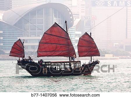 China, Hong Kong, Victoria Harbour, a sightseeing junk against the backdrop of the Hong Kong Convention and Exhibition Center View Large Photo Image Stock Photograph - China, Hong Kong, Victoria Harbour, a sightseeing junk against the backdrop of the Hong Kong Convention and Exhibition Center. Fotosearch