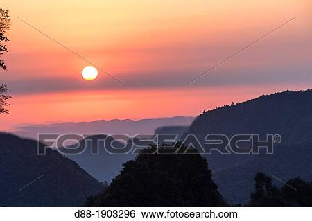Stock Photograph - China, Hunan Province, Zhangjiajie National Forest Park UNESCO World Heritage Site, Tianzi Mountains, sunrise. Fotosearch