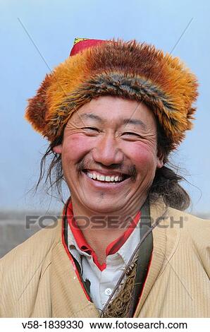 China, Qinghai, Amdo, Xining surroundings, Kumbum monastery Ta? er Si, Tibetan pilgrim wearing a fur cap View Large Photo Image Stock Image - China, Qinghai, Amdo, Xining surroundings, Kumbum monastery Ta? er Si, Tibetan pilgrim wearing a fur cap. Fotosearch