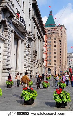 China, Shanghai, Huangpu District, The Bund, East Zhongshan Road, Art Deco Neo Classical style buildings, historic, Cathay Fairmont Peace Hotel 1929, Palace Hotel 1906, Chartered Bank 1923, North China Daily 1921, poinsettia, flowers, View Large Photo Image Stock Image - China, Shanghai, Huangpu District, The Bund, East Zhongshan Road, Art Deco Neo Classical style buildings, historic, Cathay Fairmont Peace Hotel 1929, Palace Hotel 1906, Chartered Bank 1923, North China Daily 1921, poinsettia, flowers,. Fotosearch