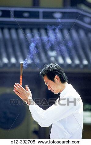China. Shanghai. Longhua Buddhist temple, praying View Large Photo Image Stock Photography - China. Shanghai. Longhua Buddhist temple, praying. Fotosearch