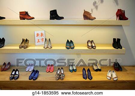 China, Shanghai, Luwan District, Xintiandi, Fuxing Middle Road, women's shoe store, retail display, fashion, Mandarin symbols, hanzi, View Large Photo Image Stock Photography - China, Shanghai, Luwan District, Xintiandi, Fuxing Middle Road, women's shoe store, retail display, fashion, Mandarin symbols, hanzi,. Fotosearch