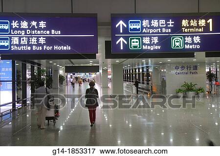 China, Shanghai, Pudong International Airport, PVG, gate area, concourse, terminal, Chinese Mandarin symbols, hanzi, characters, sign, information, directions, bus, shuttle, Maglev, Metro, subway, English language, View Large Photo Image Stock Photo - China, Shanghai, Pudong International Airport, PVG, gate area, concourse, terminal, Chinese Mandarin symbols, hanzi, characters, sign, information, directions, bus, shuttle, Maglev, Metro, subway, English language,. Fotosearch