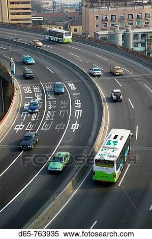 China. Shanghai. Shanghai City: Nanpu Bridge over the Haungpu River / Circular Highway Ramps / Morning View Large Photo Image Stock Photography - China. Shanghai. Shanghai City: Nanpu Bridge over the Haungpu River / Circular Highway Ramps / Morning. Fotosearch
