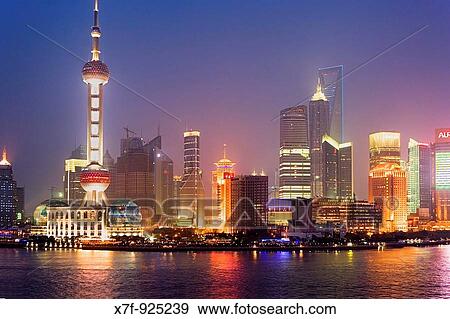 China Shanghai: Skyscrapers at Pudong Huangpu River At left Oriental Pearl Tower At righ Jin Mao Building and Shanghai World Financial Center SWFC View Large Photo Image Stock Photo - China Shanghai: Skyscrapers at Pudong Huangpu River At left Oriental Pearl Tower At righ Jin Mao Building and Shanghai World Financial Center SWFC. Fotosearch
