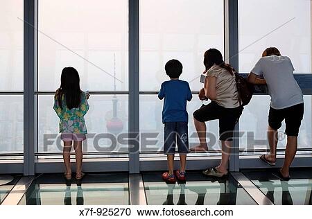 China Shanghai: Top of Shanghai World Financial Center SWFC In background Orient Pearl tower View Large Photo Image Stock Image - China Shanghai: Top of Shanghai World Financial Center SWFC In background Orient Pearl tower. Fotosearch